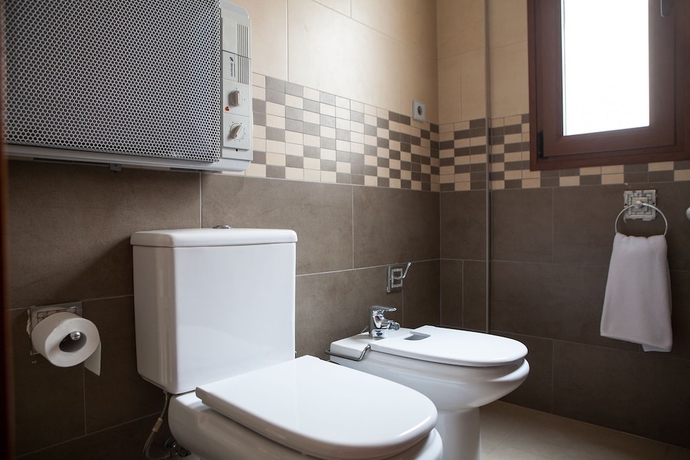 Imagen de la habitación del Apartamentos Real De Cartuja And Suites. Foto 18