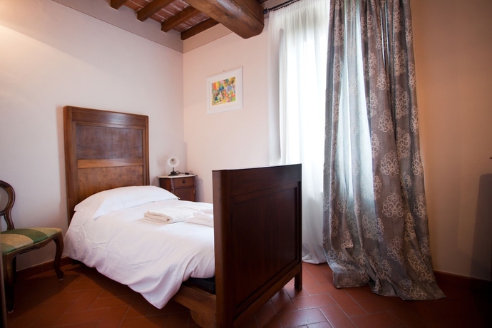 Imagen de la habitación del Apartamentos Relais Villa Belvedere. Foto 16