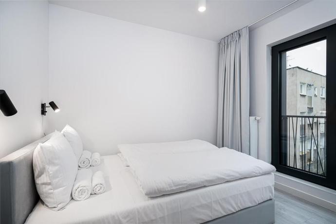 Imagen de la habitación del Apartamentos RentPlanet Jodłowa Residence. Foto 8