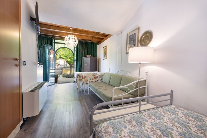 Imagen de la habitación del Apartamentos Residence Gardasee Apartments With Lake View. Foto 12