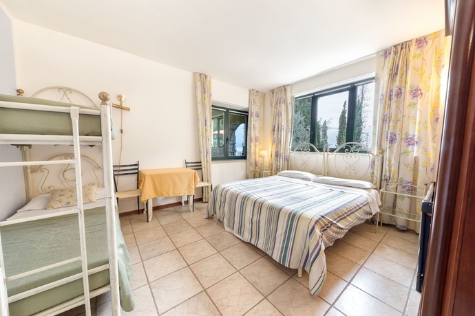 Imagen de la habitación del Apartamentos Residence Gardasee Apartments With Lake View. Foto 13