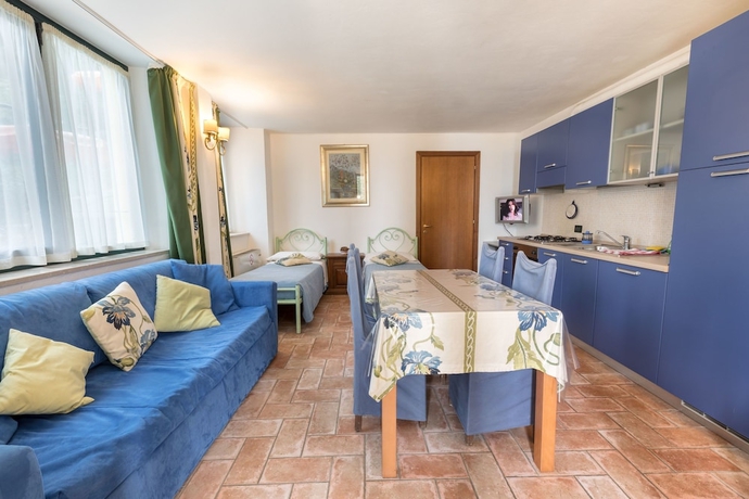 Imagen de la habitación del Apartamentos Residence Gardasee Apartments With Lake View. Foto 14