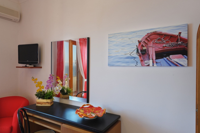 Imagen de la habitación del Apartamentos Residence Il Giardino dei Limoni. Foto 4