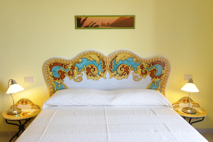 Imagen de la habitación del Apartamentos Residence Il Giardino dei Limoni. Foto 6