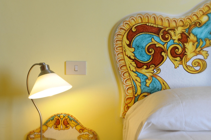 Imagen de la habitación del Apartamentos Residence Il Giardino dei Limoni. Foto 8