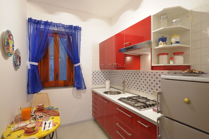 Imagen de la habitación del Apartamentos Residence Il Giardino dei Limoni. Foto 9