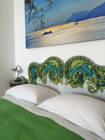 Imagen de la habitación del Apartamentos Residence Il Giardino dei Limoni. Foto 10