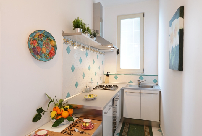 Imagen de la habitación del Apartamentos Residence Il Giardino dei Limoni. Foto 13