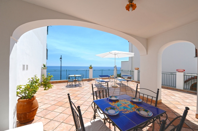 Imagen de la habitación del Apartamentos Residence Il Giardino dei Limoni. Foto 14