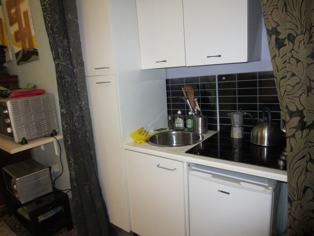 Imagen de la habitación del Apartamentos Residenza Aria Della Ripa - Apartments and Suites. Foto 2