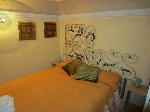 Imagen de la habitación del Apartamentos Residenza Aria Della Ripa - Apartments and Suites. Foto 4