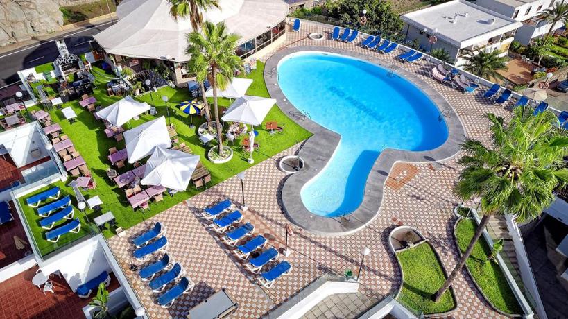 Imagen de la piscina del Apartamentos Rio Piedras. Foto 13