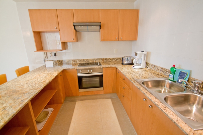 Imagen de la habitación del Apartamentos Riviera Maya Suites. Foto 6