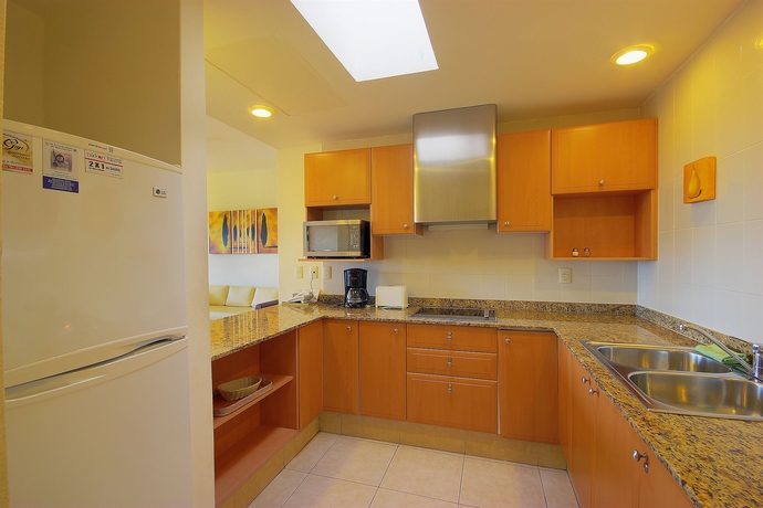 Imagen de la habitación del Apartamentos Riviera Maya Suites. Foto 8