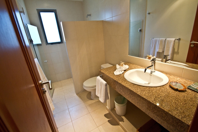 Imagen de la habitación del Apartamentos Riviera Maya Suites. Foto 11