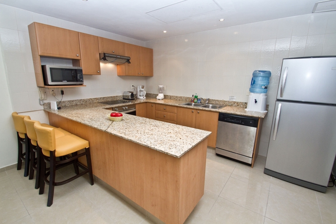 Imagen de la habitación del Apartamentos Riviera Maya Suites. Foto 12