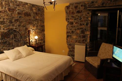 Imagen de la habitación del Apartamentos Rodiles Rural. Foto 3