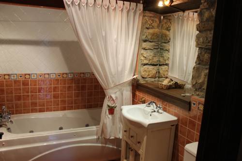 Imagen de la habitación del Apartamentos Rodiles Rural. Foto 4