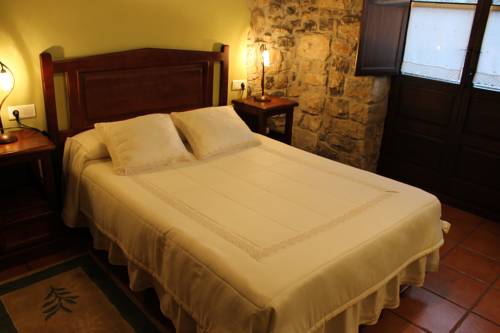 Imagen de la habitación del Apartamentos Rodiles Rural. Foto 6