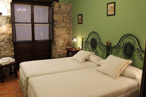 Imagen de la habitación del Apartamentos Rodiles Rural. Foto 14