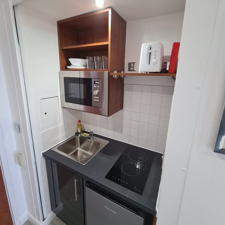 Imagen de la habitación del Apartamentos Roland House Apartments. Foto 13