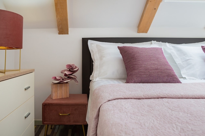 Imagen de la habitación del Apartamentos Romantic apartment in the attic. Foto 7