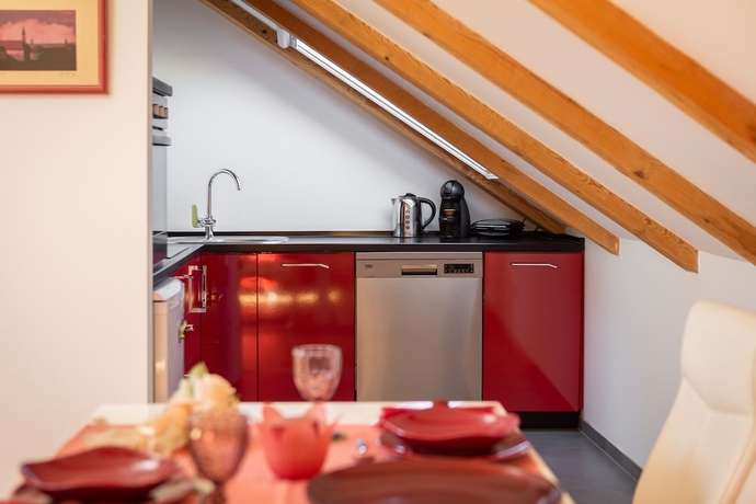 Imagen de la habitación del Apartamentos Romantic apartment in the attic. Foto 11