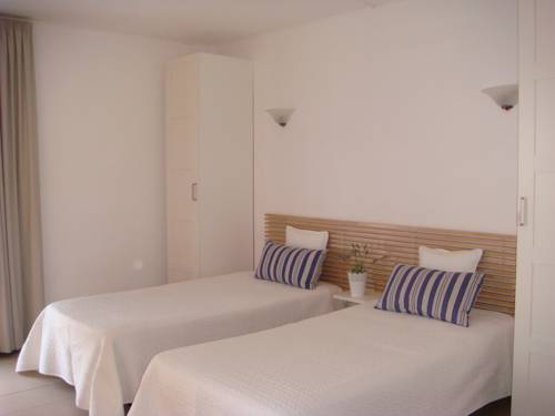 Imagen de la habitación del Apartamentos Rossio Mar. Foto 4