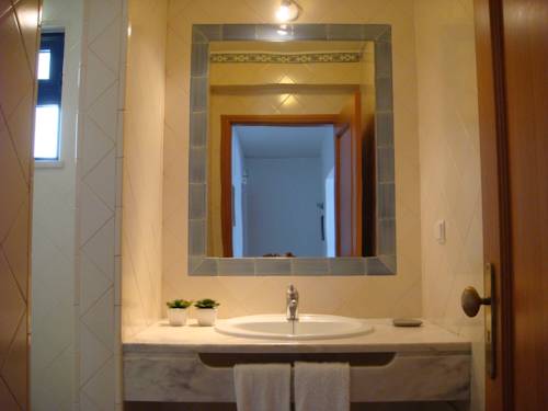 Imagen de la habitación del Apartamentos Rossio Mar. Foto 7