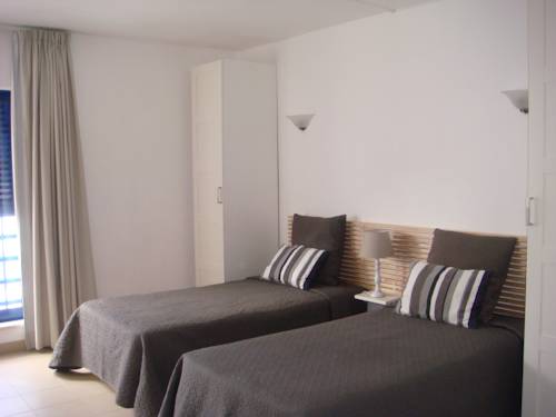 Imagen de la habitación del Apartamentos Rossio Mar. Foto 9