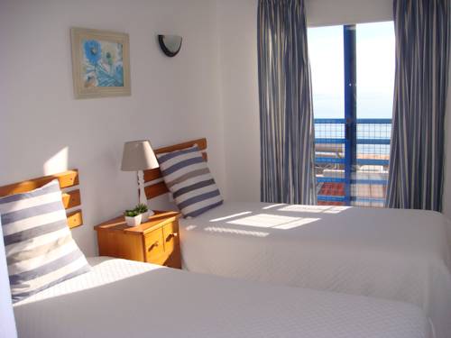 Imagen de la habitación del Apartamentos Rossio Mar. Foto 11