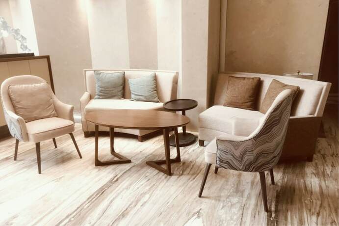 Imagen del bar/restaurante del Apartamentos Royal Star Apartment Central City Branch. Foto 8