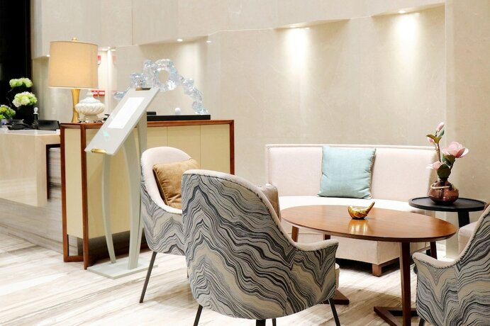 Imagen del bar/restaurante del Apartamentos Royal Star Apartment Central City Branch. Foto 10