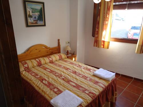 Imagen de la habitación del Apartamentos Rurales Las Chimeneas. Foto 9