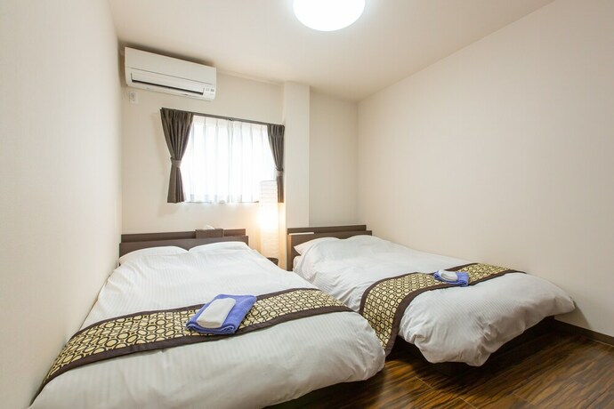Imagen de la habitación del Apartamentos Ryugu, Osaka. Foto 30