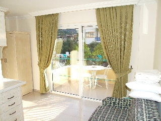 Imagen de la habitación del Apartamentos Sahin Palace. Foto 6