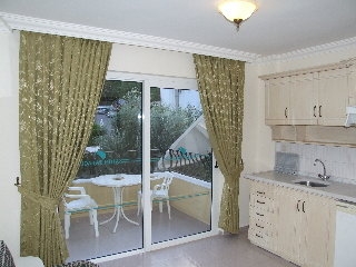 Imagen de la habitación del Apartamentos Sahin Palace. Foto 9