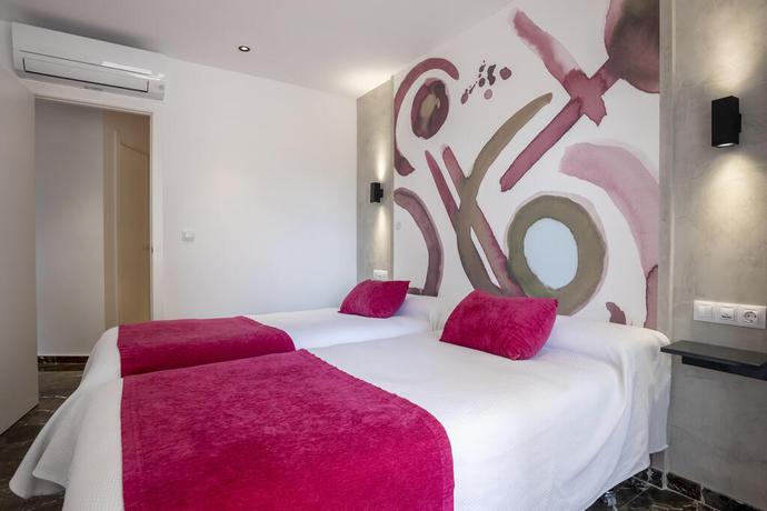 Imagen de la habitación del Apartamentos San Jaime Center Suites. Foto 8