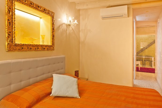 Imagen de la habitación del Apartamentos San Marco Terrace. Foto 6