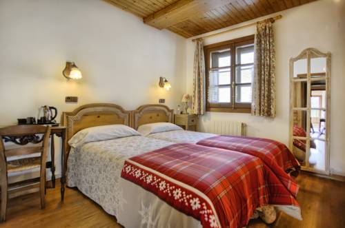 Imagen de la habitación del Apartamentos San Marsial Benasque Hotelandapartamentos. Foto 5