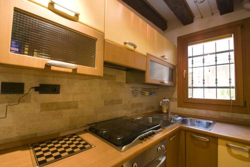 Imagen de la habitación del Apartamentos San Polo y Santa Croce. Foto 10