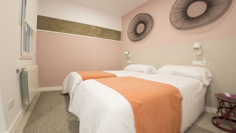 Imagen de la habitación del Apartamentos Santiago Center Rooms. Foto 9