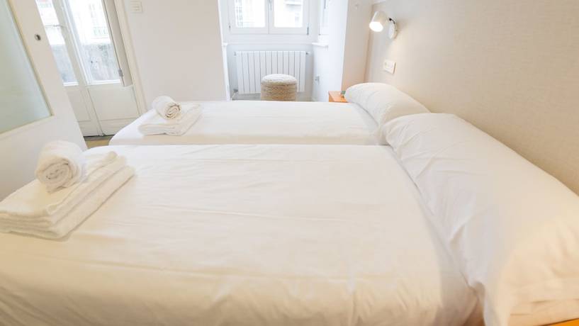 Imagen de la habitación del Apartamentos Santiago Center Rooms. Foto 10