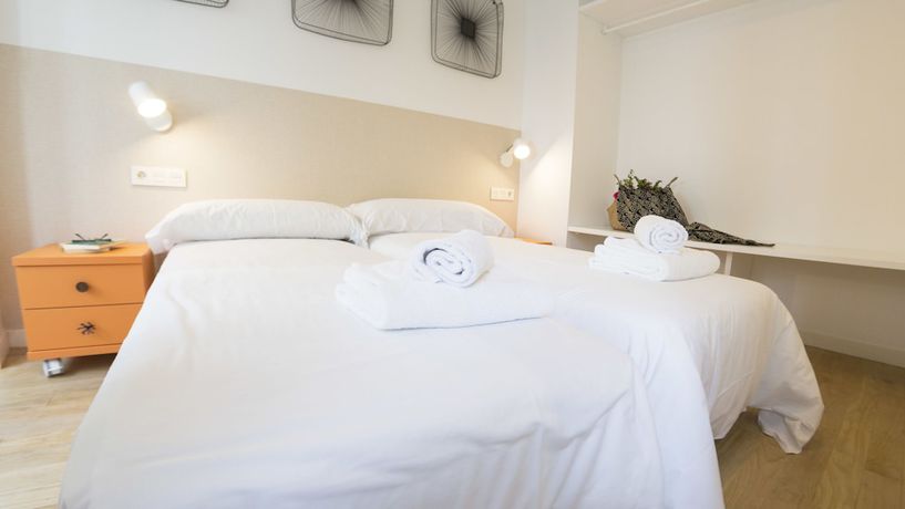 Imagen de la habitación del Apartamentos Santiago Center Rooms. Foto 11