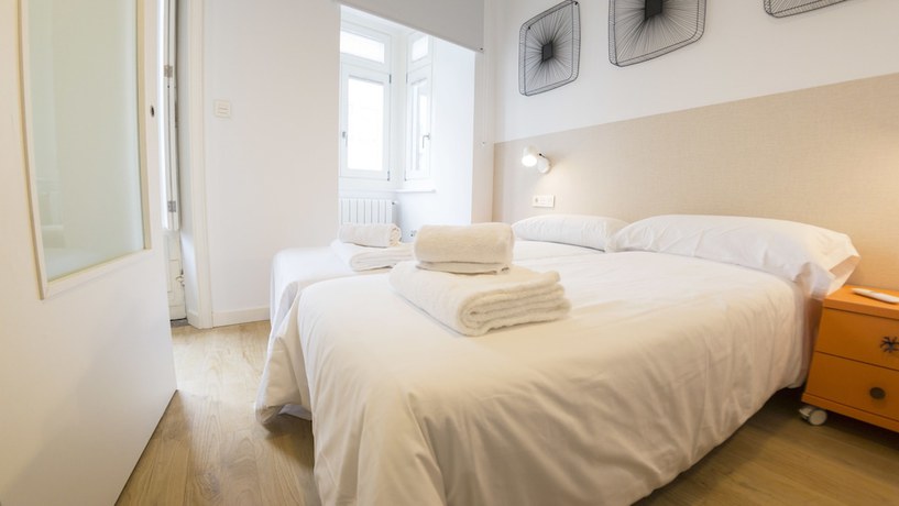 Imagen de la habitación del Apartamentos Santiago Center Rooms. Foto 13