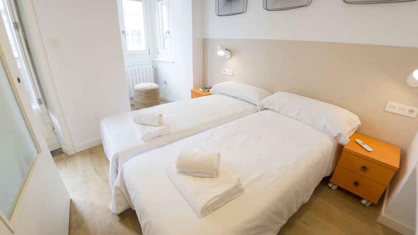 Imagen de la habitación del Apartamentos Santiago Center Rooms. Foto 18