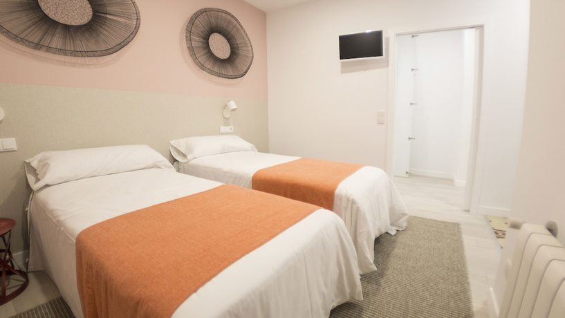 Imagen de la habitación del Apartamentos Santiago Center Rooms. Foto 19