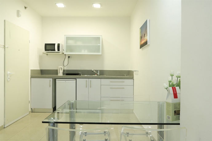 Imagen de la habitación del Apartamentos Sea Land Suites. Foto 6