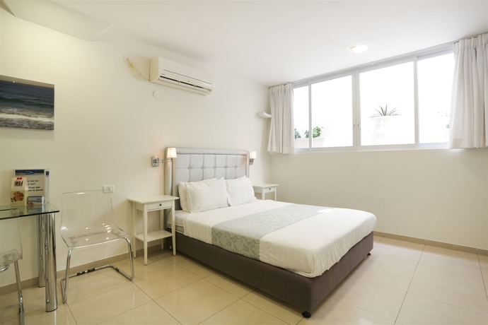 Imagen de la habitación del Apartamentos Sea Land Suites. Foto 10