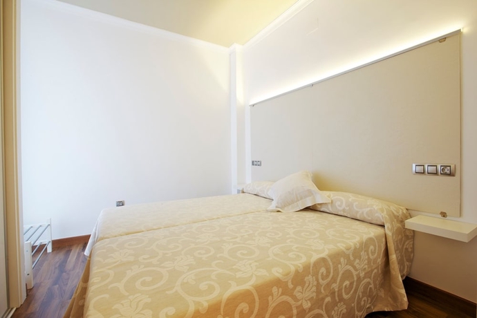 Imagen de la habitación del Apartamentos Senabre Palais. Foto 4